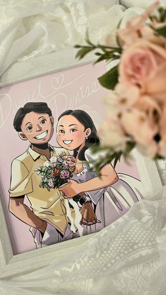 Wedding guests posing with their finished sketches